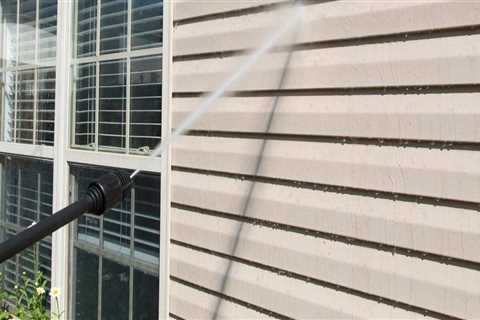 Can you power wash house windows?